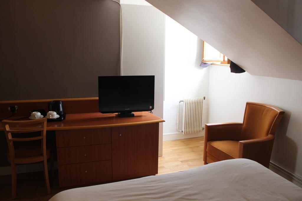 Hotel Metropolitain Paris Quarto foto